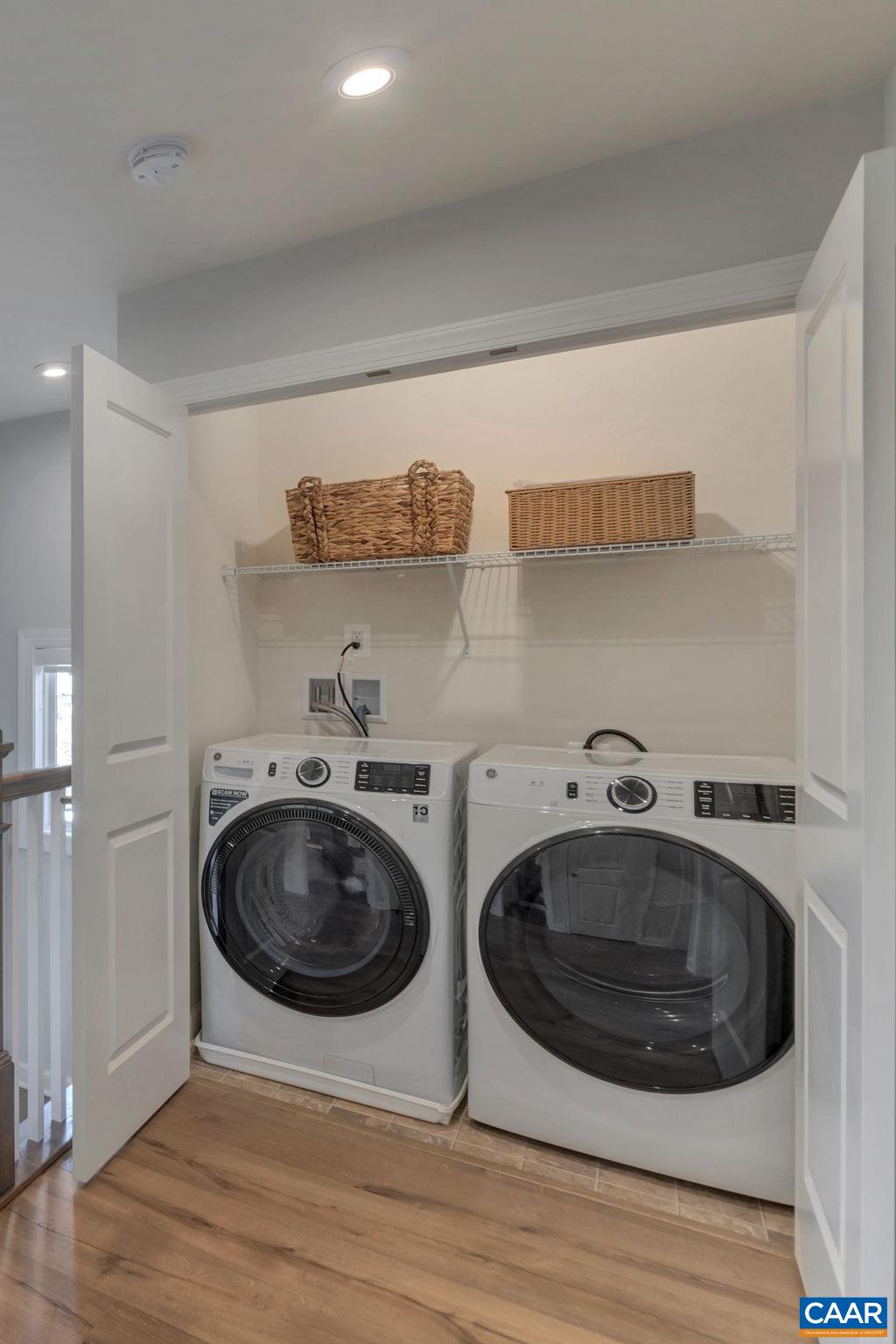 1842 Fowler Street Charlottesville, VA 22901 - Photo 40 of 44 a utility room with sink dryer and washer