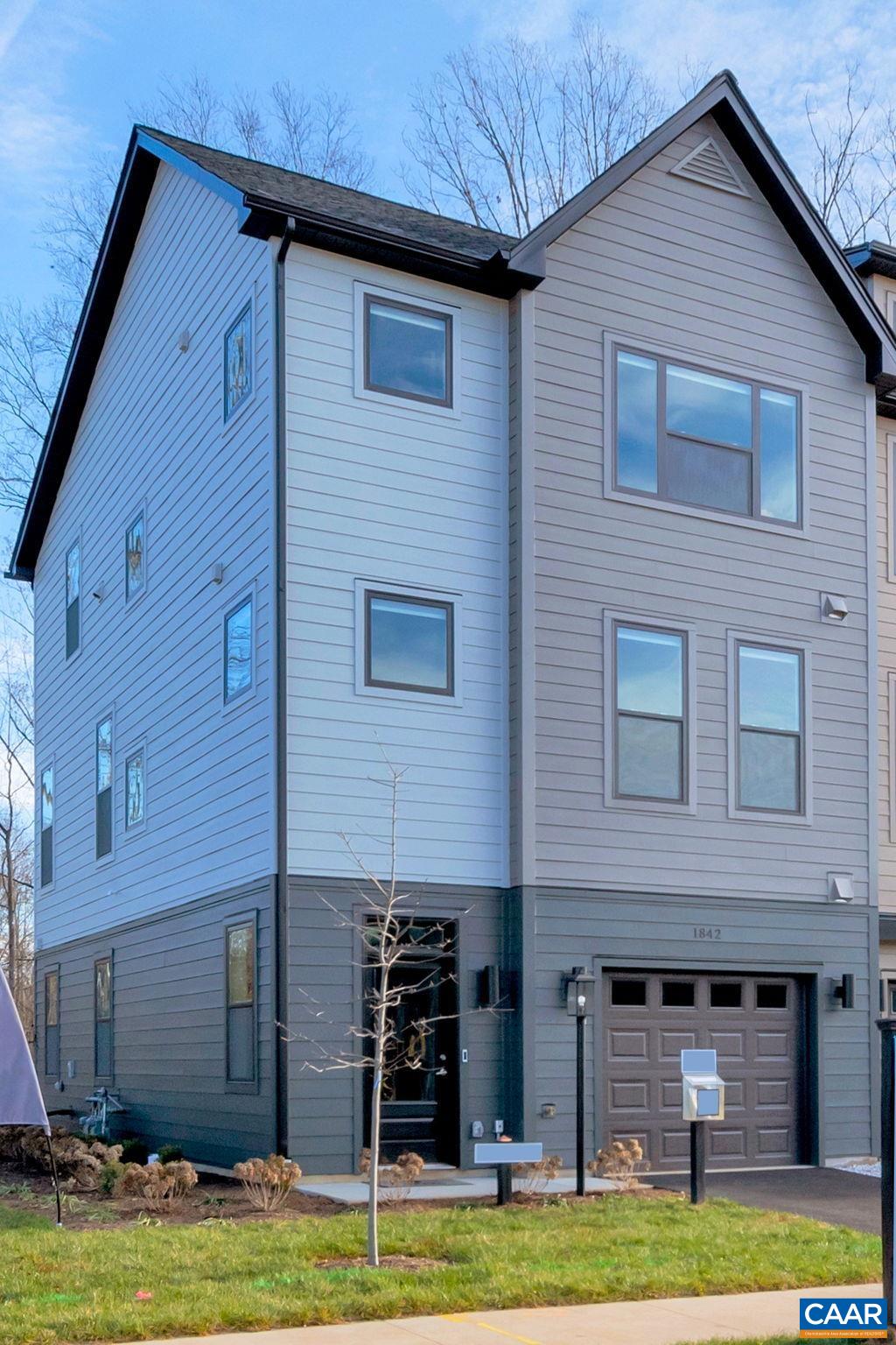 1842 Fowler Street Charlottesville, VA 22901 - Photo 4 of 44 a view of a house with swimming pool