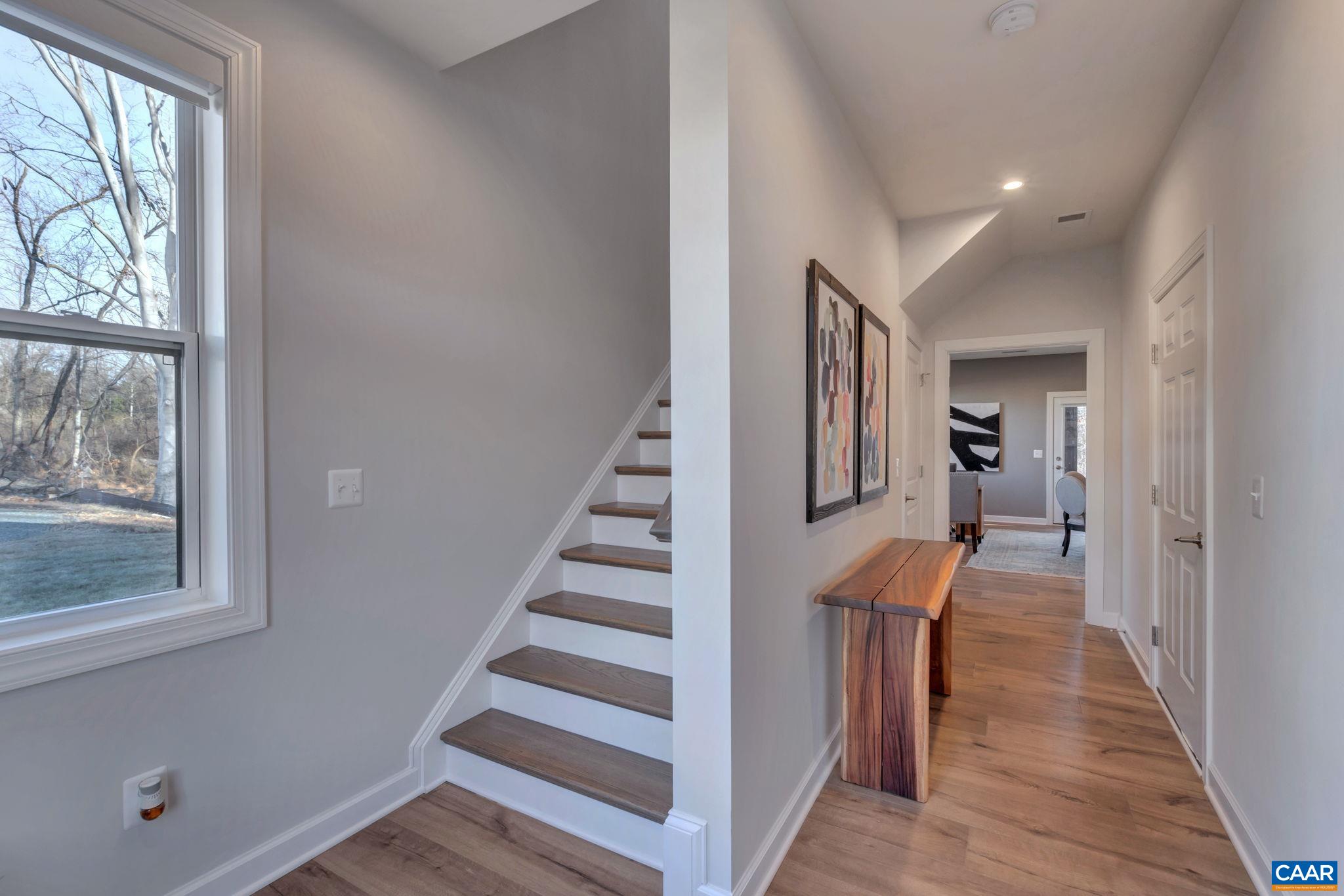 1842 Fowler Street Charlottesville, VA 22901 - Photo 9 of 44 a view of a hallway with wooden floor and entryway