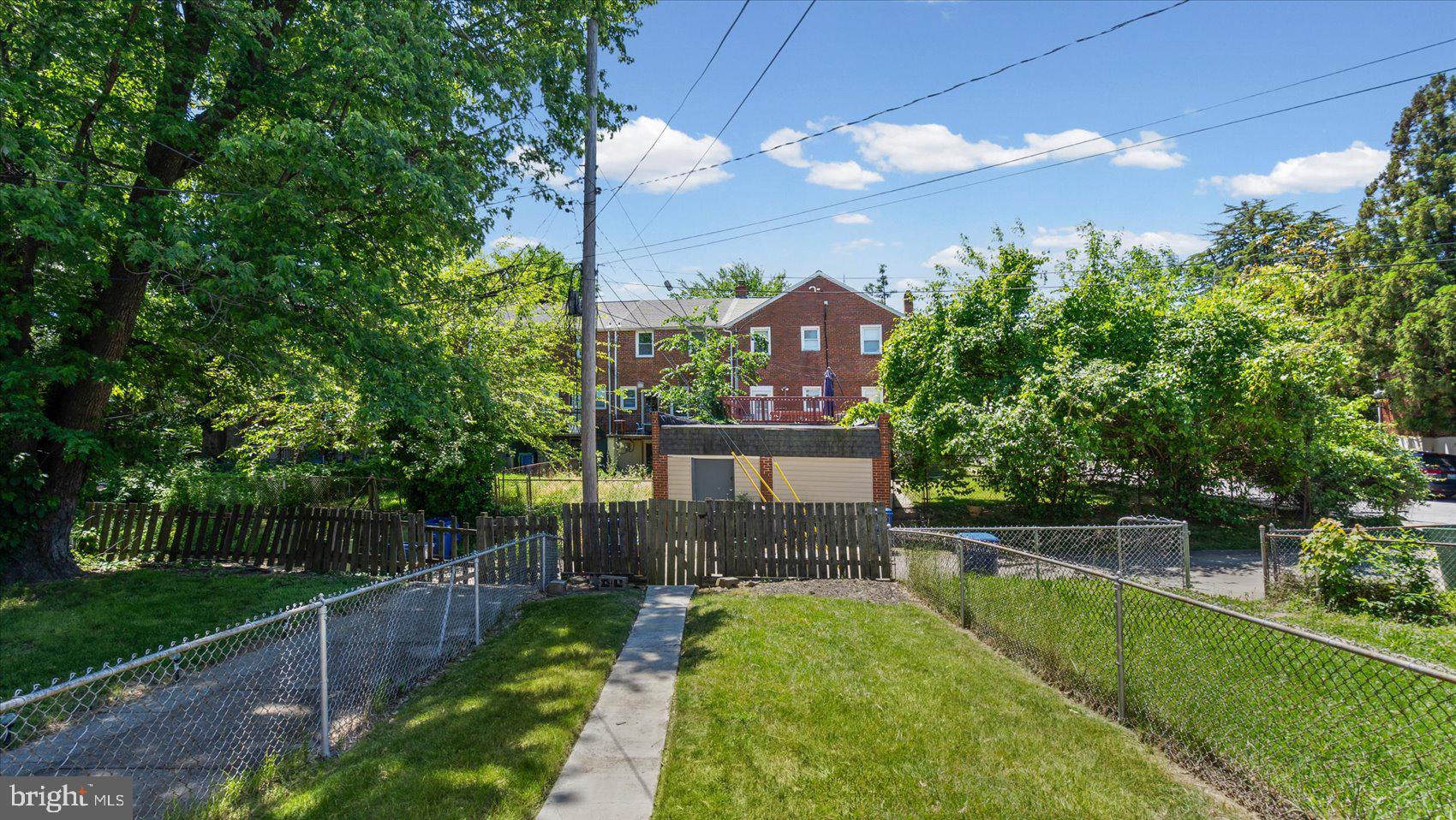 1805 Crestview Road Baltimore, MD 21239 - Photo 34 of 39 a view of a house with backyard and sitting area