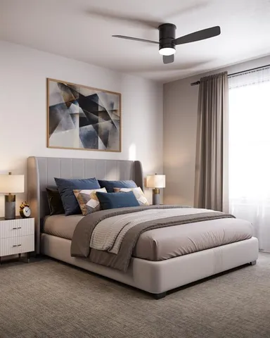 a bedroom with bed and a chandelier