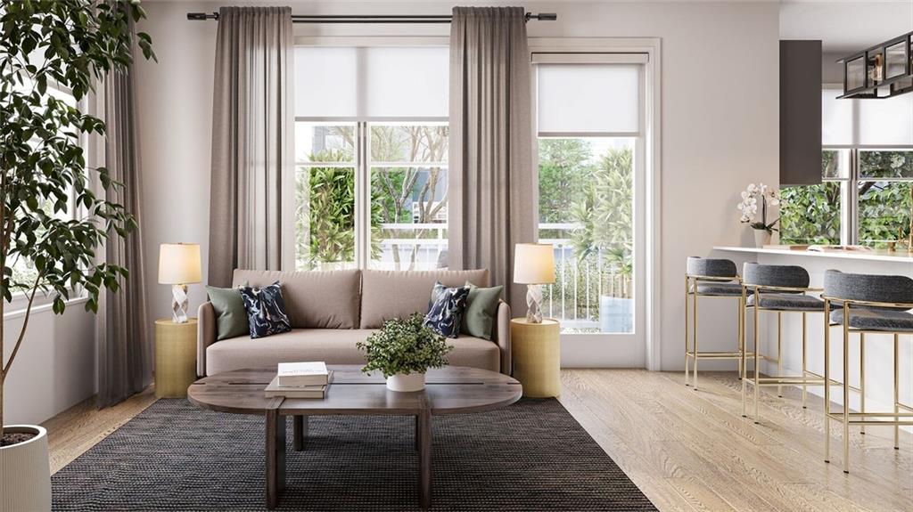 3753 Austell Road, Unit C1 Marietta, GA 30008 - Photo 5 of 16 a living room with furniture and a potted plant