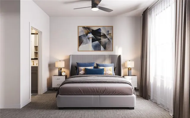 a bedroom with a bed and window