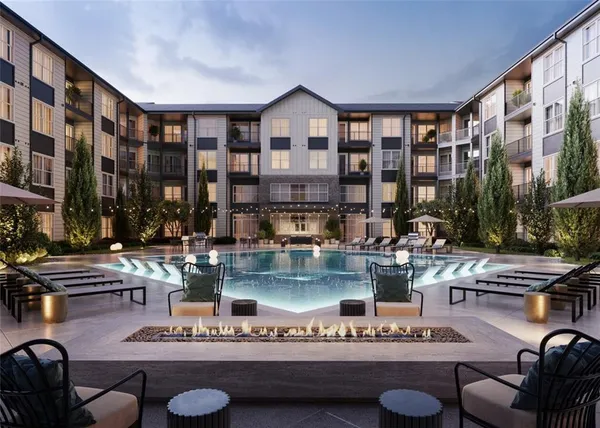 a view of swimming pool with outdoor seating