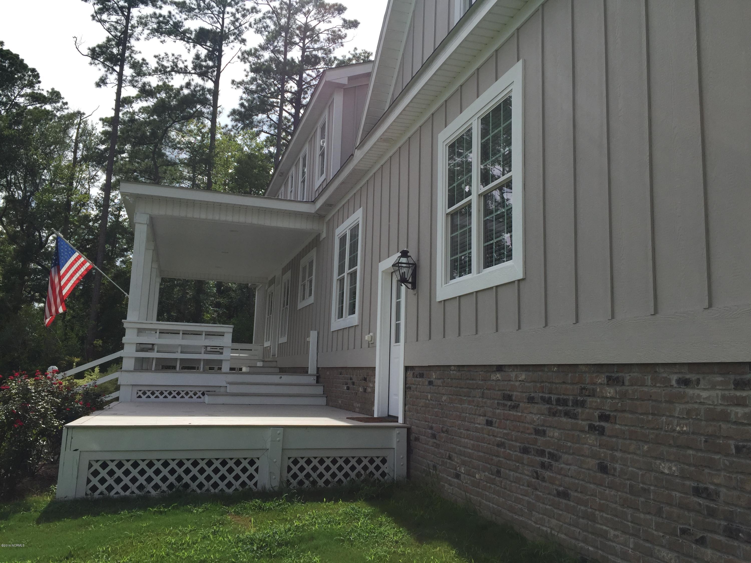 264 White Oak Bluff Road Stella, NC 28582 - Photo 18 of 48 Back Covered Porch and Deck