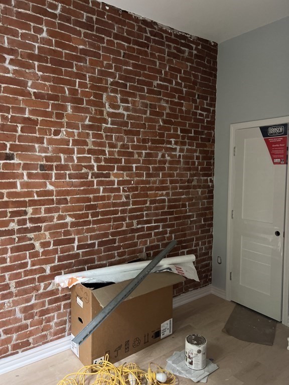 183 West Fifth Street, Unit 1 Boston, MA 02127 - Photo 12 of 16 a view of a brick wall