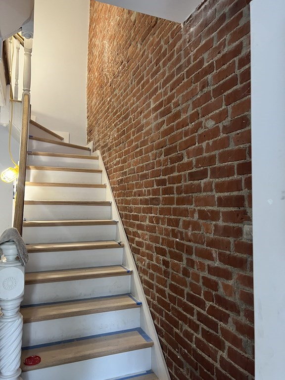 183 West Fifth Street, Unit 1 Boston, MA 02127 - Photo 15 of 16 a view of a brick wall