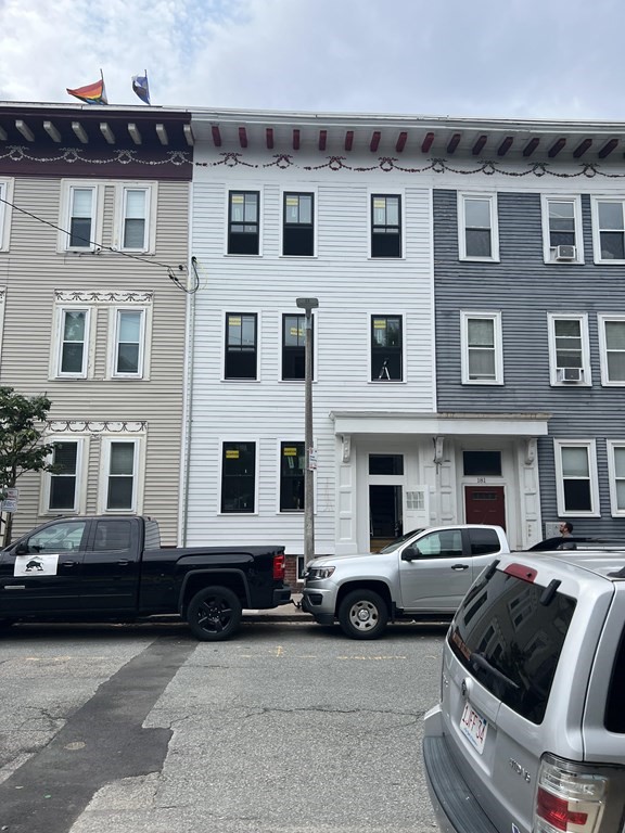 183 West Fifth Street, Unit 1 Boston, MA 02127 - Photo 16 of 16 a view of a car parked in front of a building