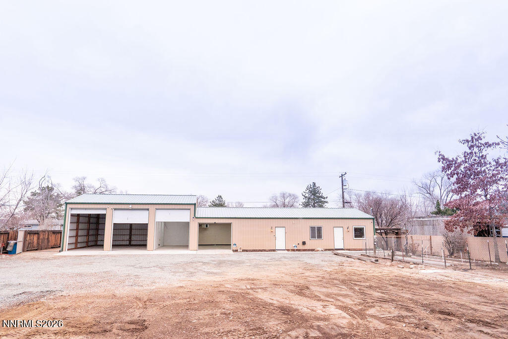 2931 Airport Road Carson City, NV 89706 - Photo 19 of 35 a view of a house with a patio