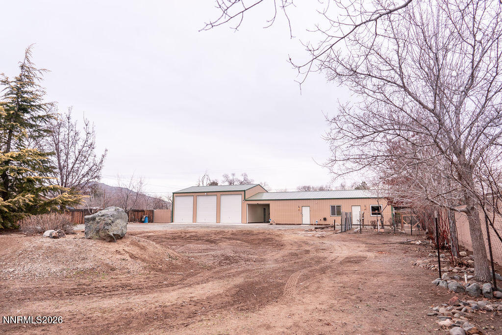 2931 Airport Road Carson City, NV 89706 - Photo 26 of 35 a front view of a house with yard porch and seating