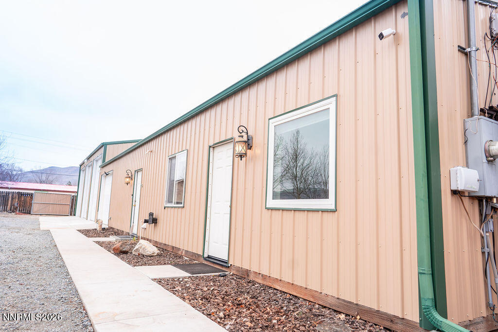 2931 Airport Road Carson City, NV 89706 - Photo 3 of 35 a front view of a house with windows