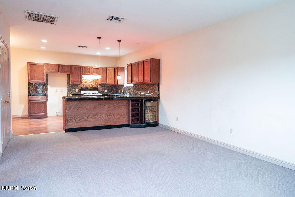2931 Airport Road Carson City, NV 89706 - Photo 4 of 35 a view of kitchen and kitchen with stainless steel appliances