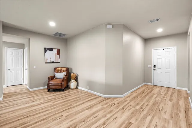 a bedroom with bed and window