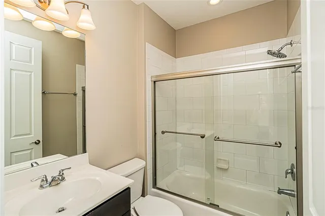 a swimming pool with outdoor seating and yard