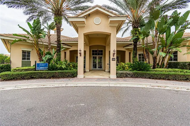 a view of swimming pool having outdoor seating