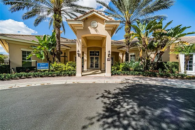 a room with furniture gym equipment and a window