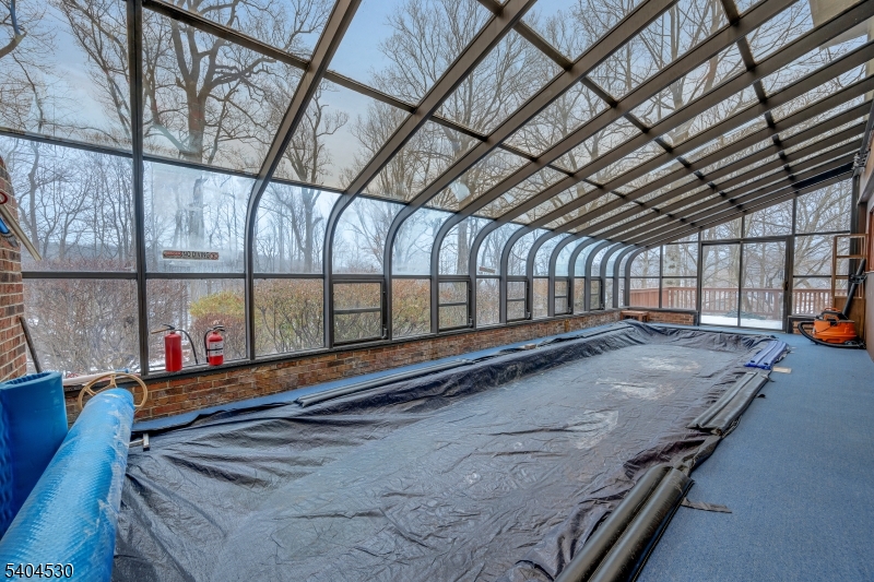 39 Woodland Road Morristown, NJ 07960 - Photo 18 of 34 a storage room with stairs