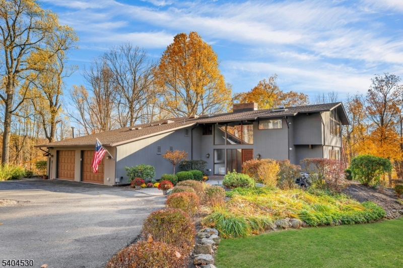 39 Woodland Road Morristown, NJ 07960 - Photo 2 of 34 a view of a house with a yard