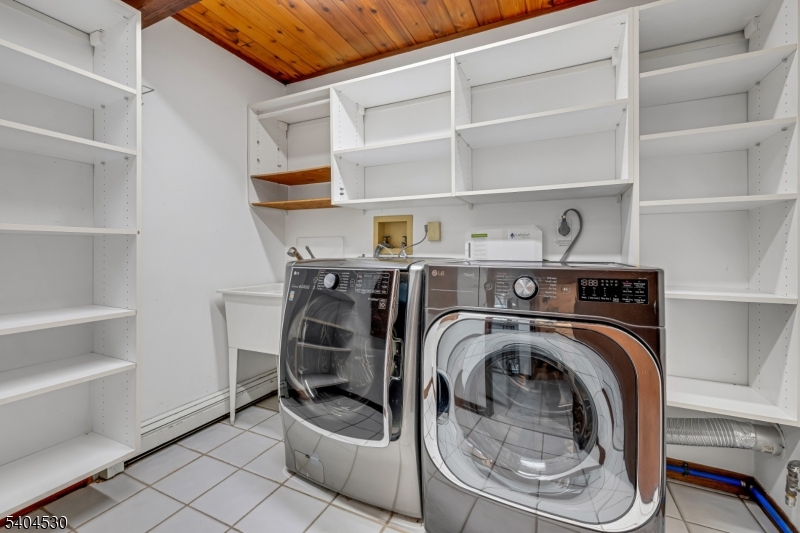39 Woodland Road Morristown, NJ 07960 - Photo 30 of 34 a utility room with cabinets