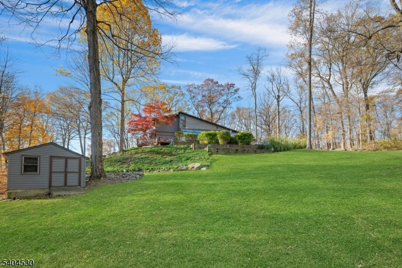 39 Woodland Road Morristown, NJ 07960 - Photo 31 of 34 a view of a house with a yard