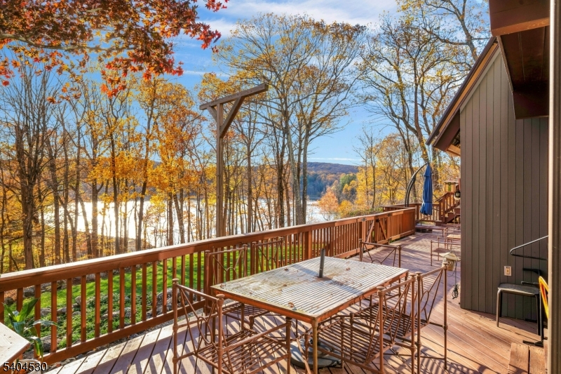 39 Woodland Road Morristown, NJ 07960 - Photo 34 of 34 a view of balcony with furniture and wooden fence