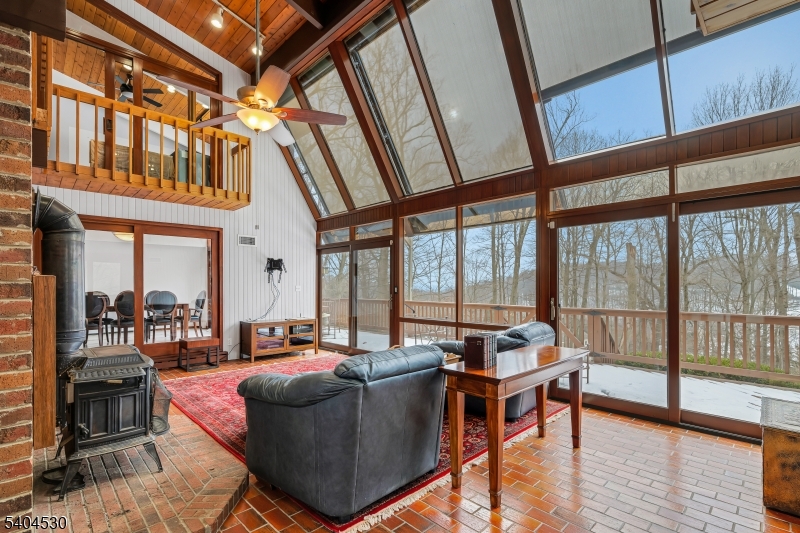 39 Woodland Road Morristown, NJ 07960 - Photo 8 of 34 a living room with furniture and a large window
