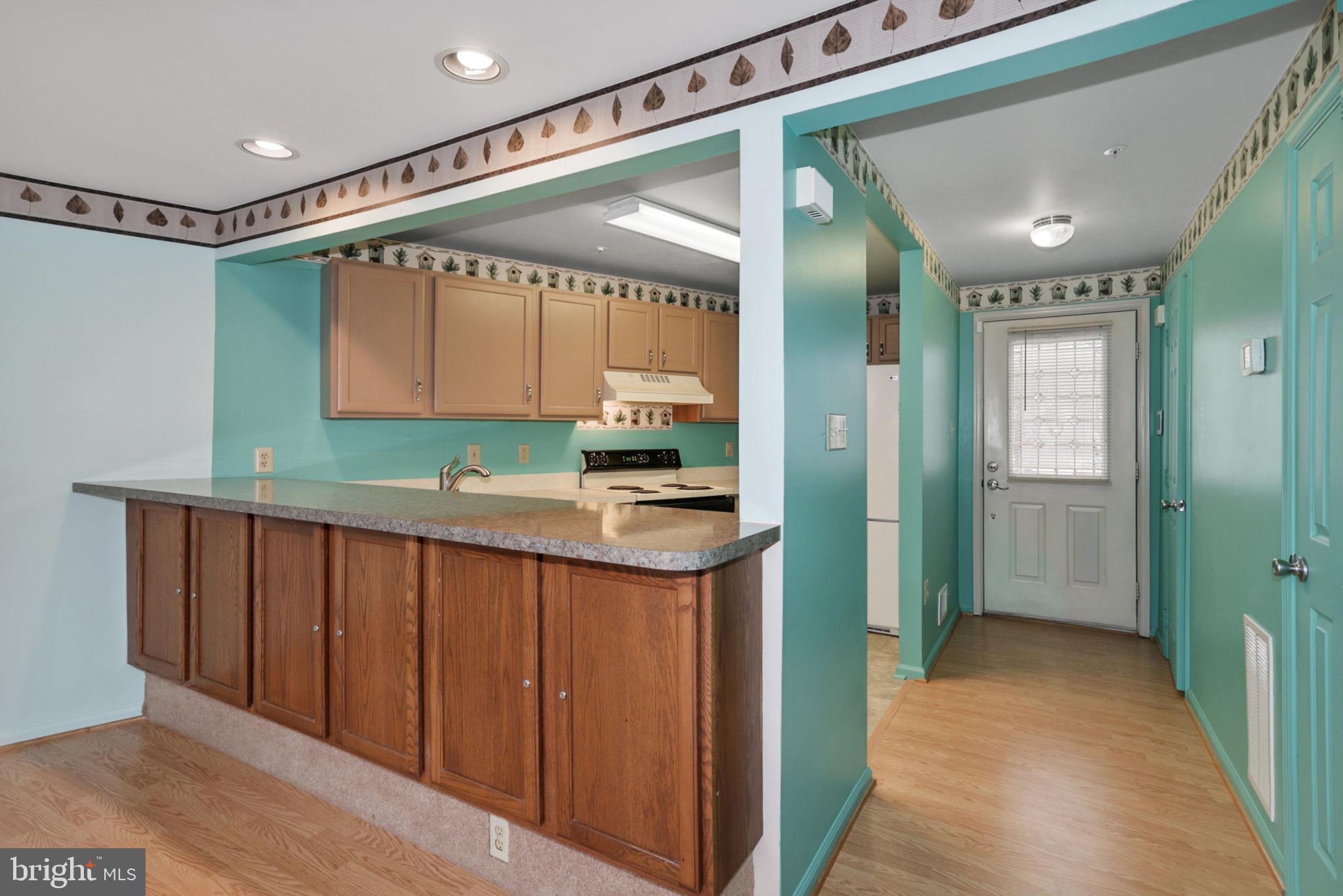 249 Sycamore Ridge Road Laurel, MD 20724 - Photo 13 of 31 Kitchen w/See-through Island to Living Room