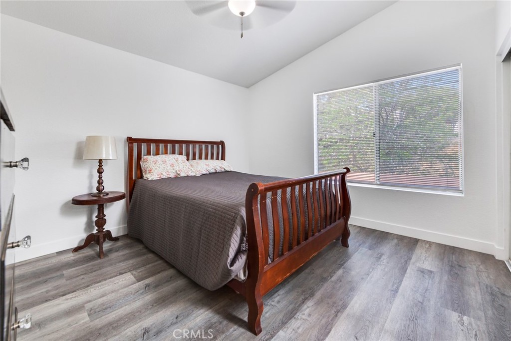 4179 Shellicia Circle Jurupa Valley, CA 92509 - Photo 14 of 25 a bedroom with a bed and a window