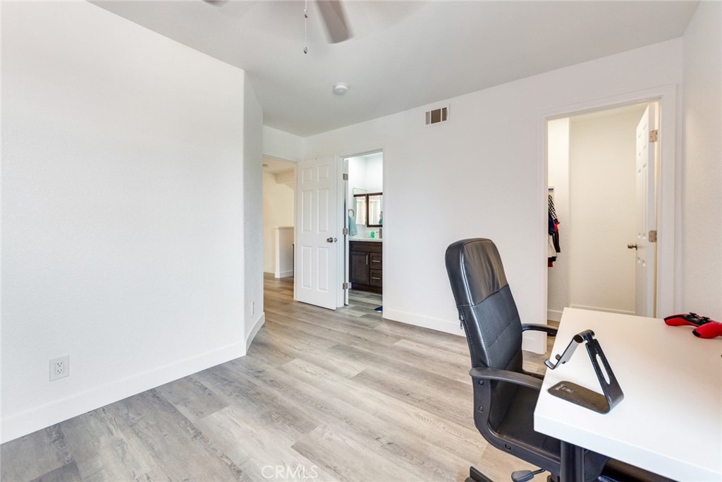 4179 Shellicia Circle Jurupa Valley, CA 92509 - Photo 22 of 25 a view of a workspace with furniture