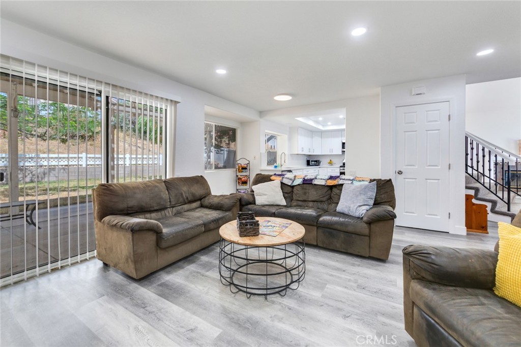 4179 Shellicia Circle Jurupa Valley, CA 92509 - Photo 6 of 25 a living room with furniture and a large window