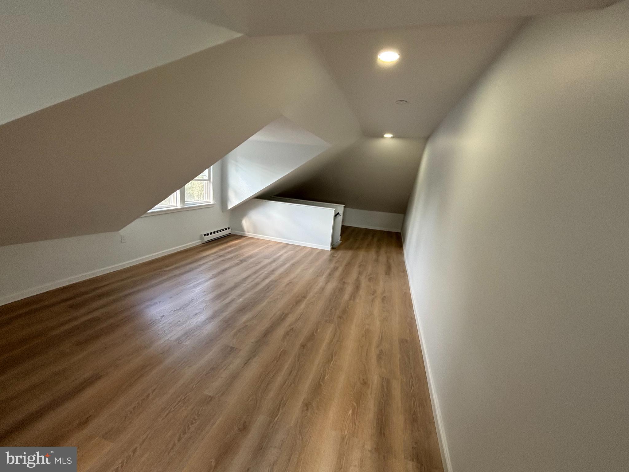 59 Pine Street Beverly, NJ 08010 - Photo 21 of 25 a view of an empty room and wooden floor
