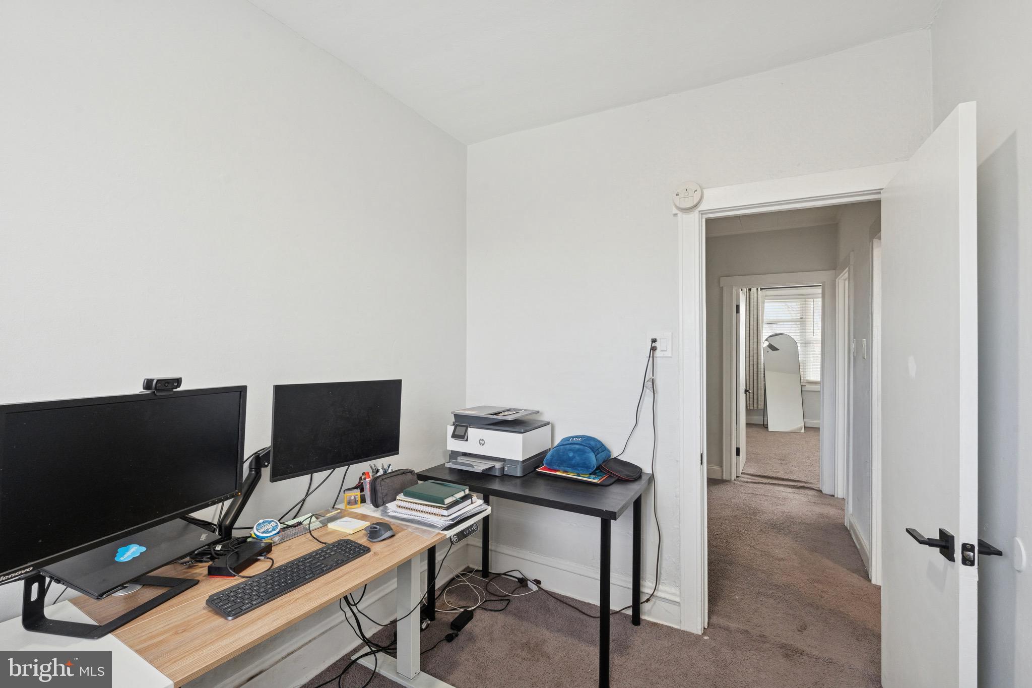 6532 Hegerman Street Philadelphia, PA 19135 - Photo 17 of 25 a view of a workspace with furniture