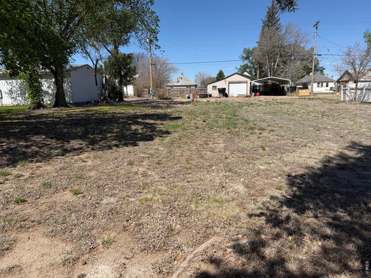 314 Colorado Avenue Stratton, CO 80836 - Photo 4 of 10 a front view of a house with a yard