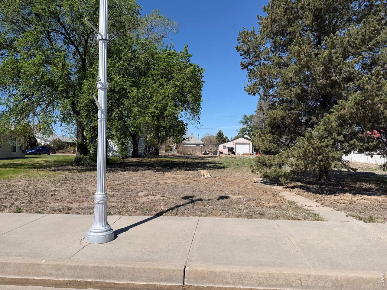 314 Colorado Avenue Stratton, CO 80836 - Photo 7 of 10 a view of a street with a tree