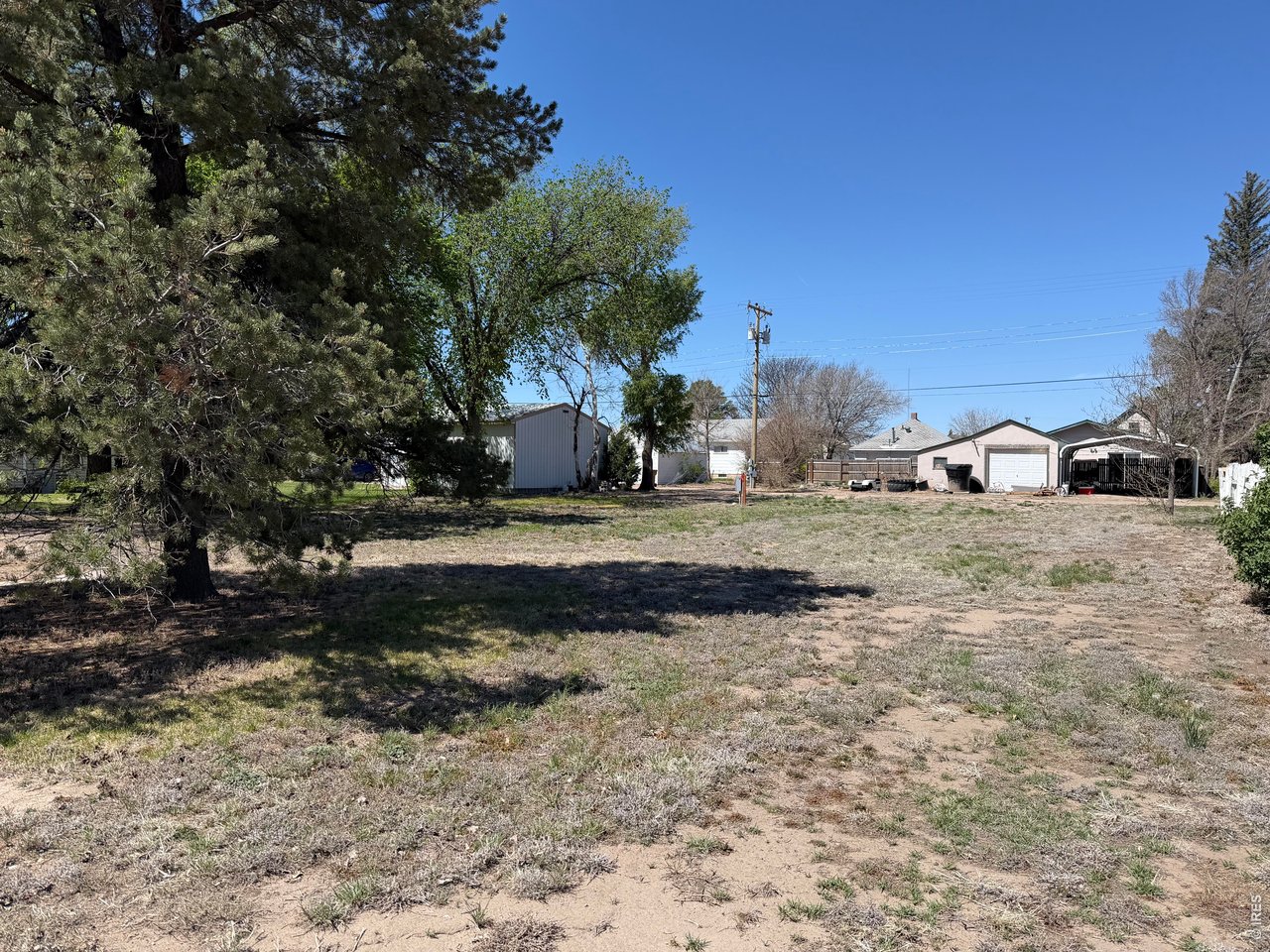 314 Colorado Avenue Stratton, CO 80836 - Photo 10 of 10 a view of a yard with a house