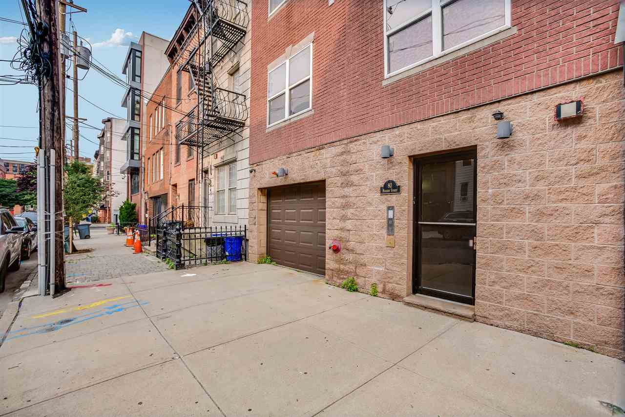 80 Madison Street, Unit 4 Hoboken, NJ 07030 - Photo 19 of 19 a view of a brick building with many windows