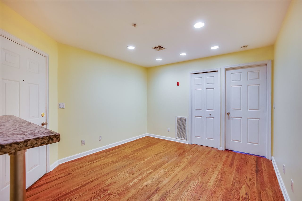 80 Madison Street, Unit 4 Hoboken, NJ 07030 - Photo 5 of 19 a view of a room with wooden floor