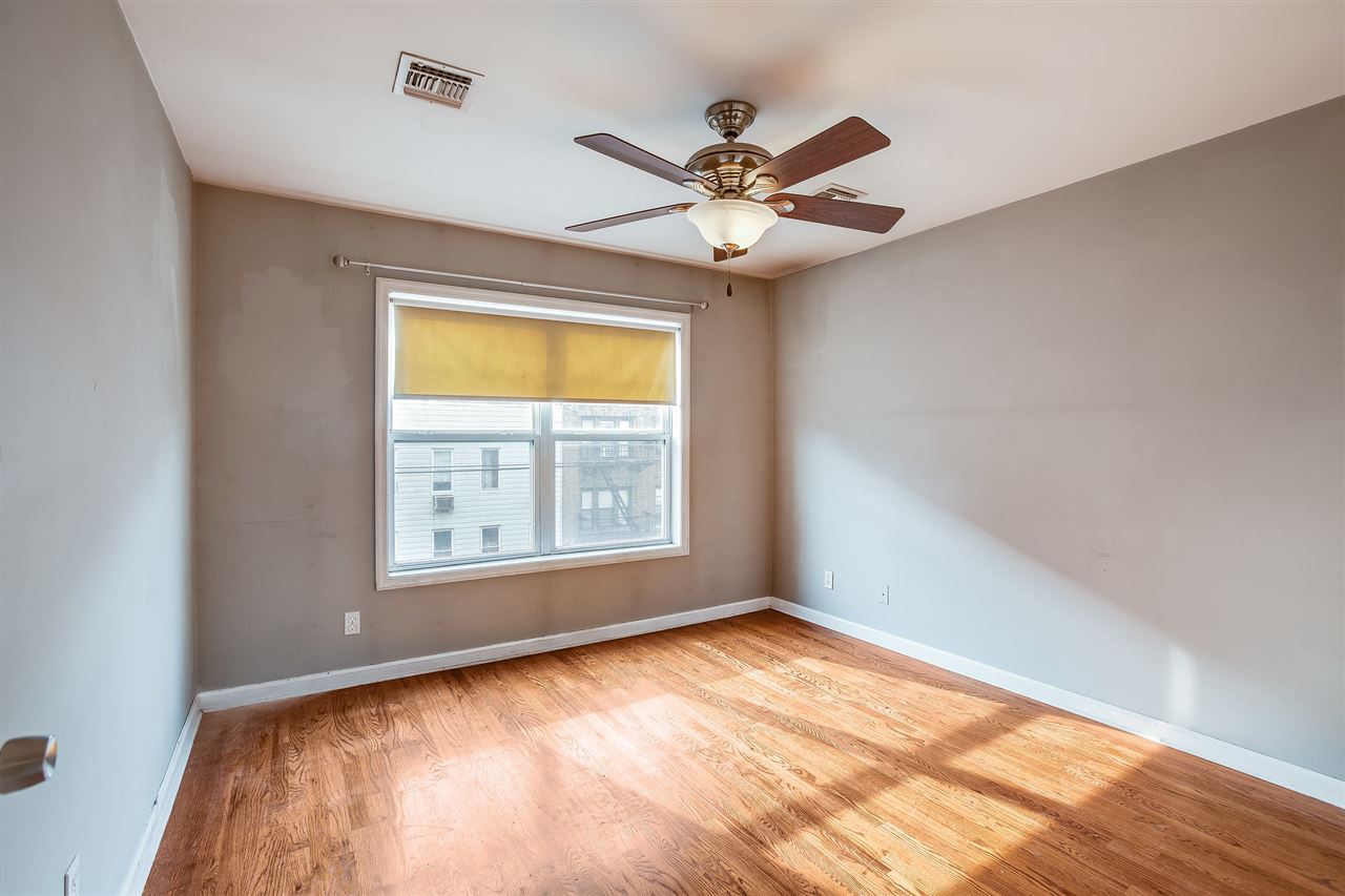 80 Madison Street, Unit 4 Hoboken, NJ 07030 - Photo 7 of 19 a view of an empty room with a window