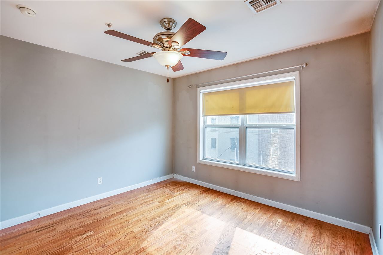 80 Madison Street, Unit 4 Hoboken, NJ 07030 - Photo 8 of 19 a view of an empty room with a window