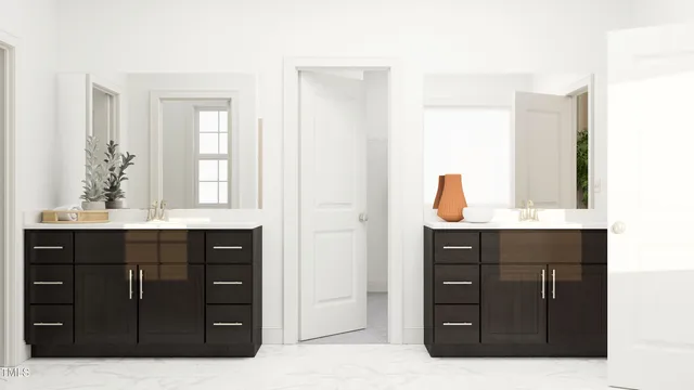 a bathroom with a sink vanity and mirror