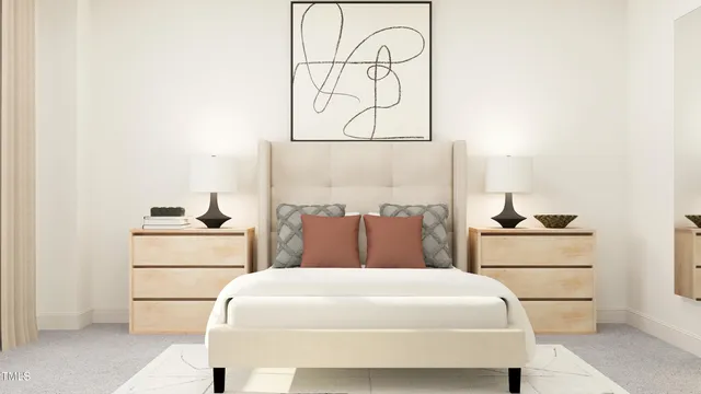 a bedroom with a bed and a table