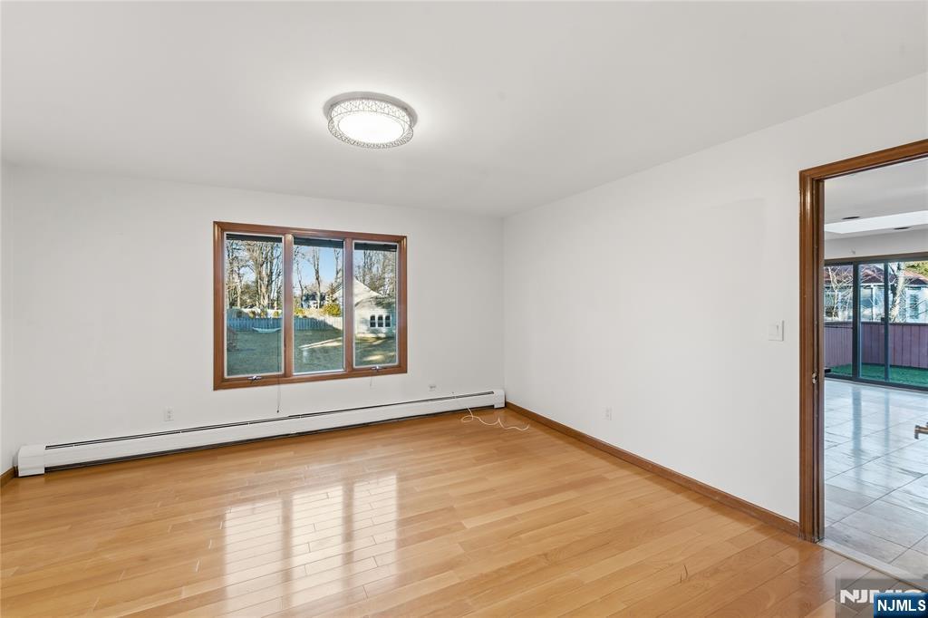 325 High Street Closter, NJ 07624 - Photo 19 of 34 an empty room with a window