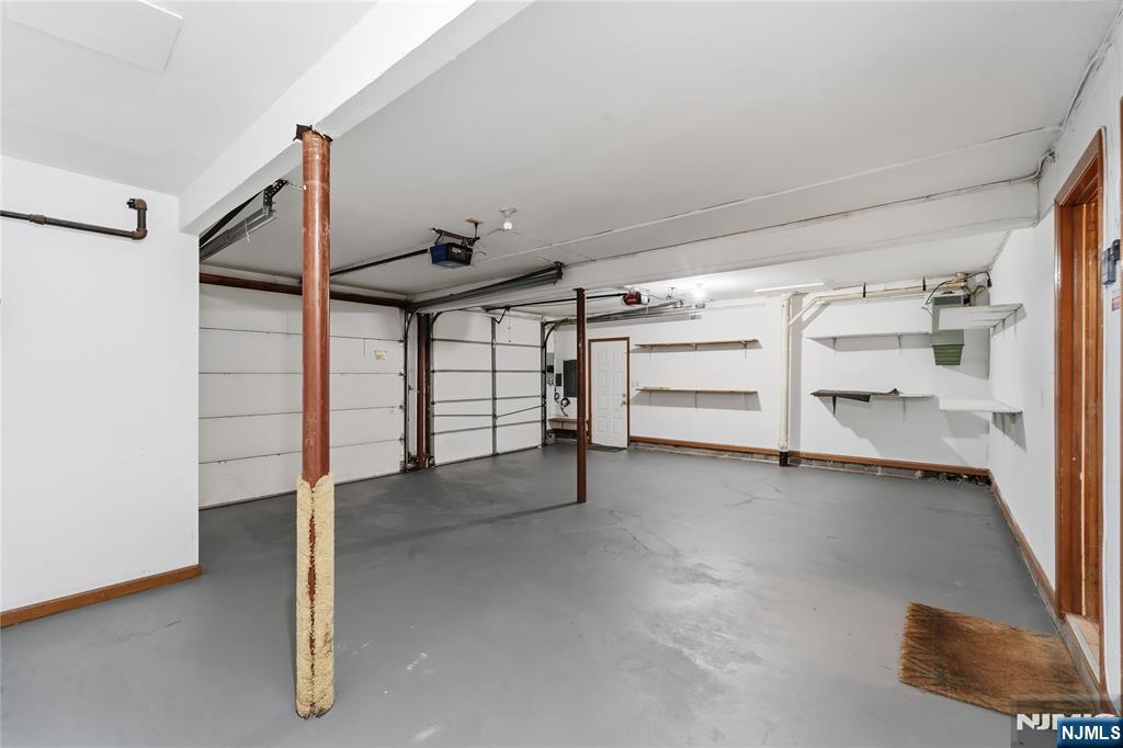 325 High Street Closter, NJ 07624 - Photo 25 of 34 a view of a room with racks on the wall