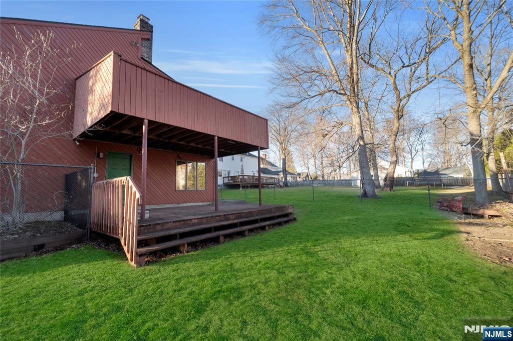 325 High Street Closter, NJ 07624 - Photo 26 of 34 a front view of a house with garden