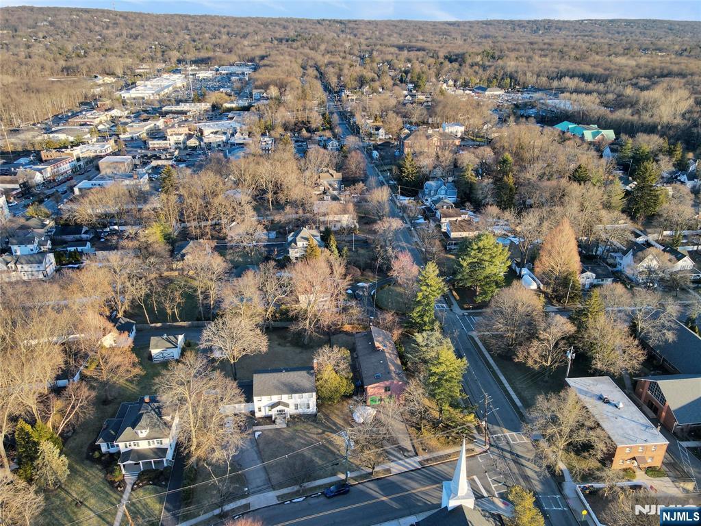 325 High Street Closter, NJ 07624 - Photo 31 of 34 an aerial view of a city with lots of residential buildings