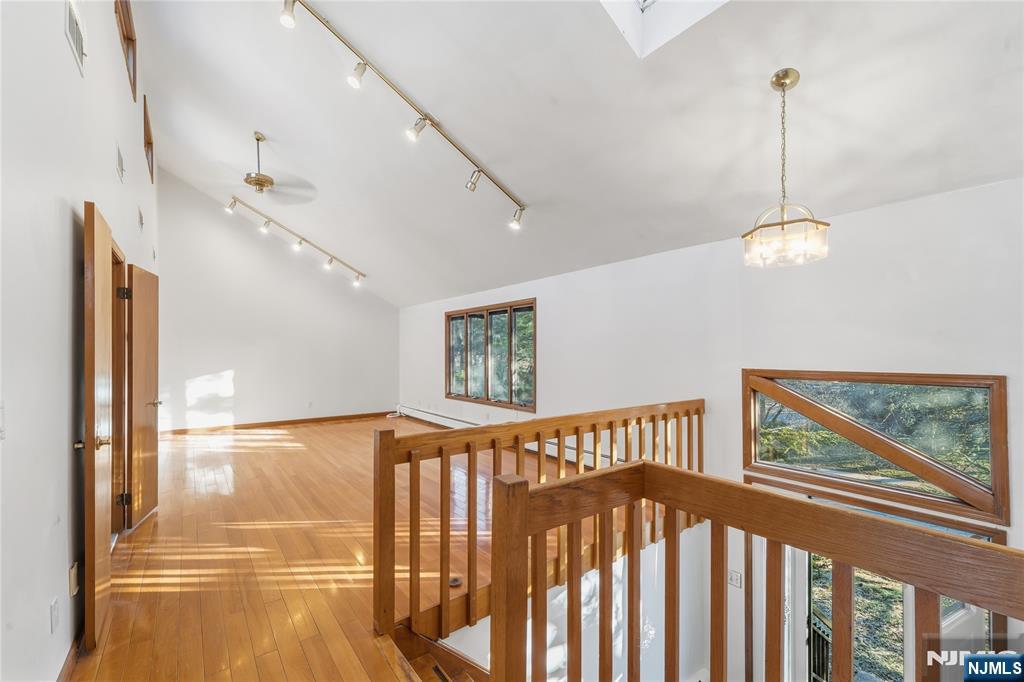 325 High Street Closter, NJ 07624 - Photo 10 of 34 a view of a hallway with windows
