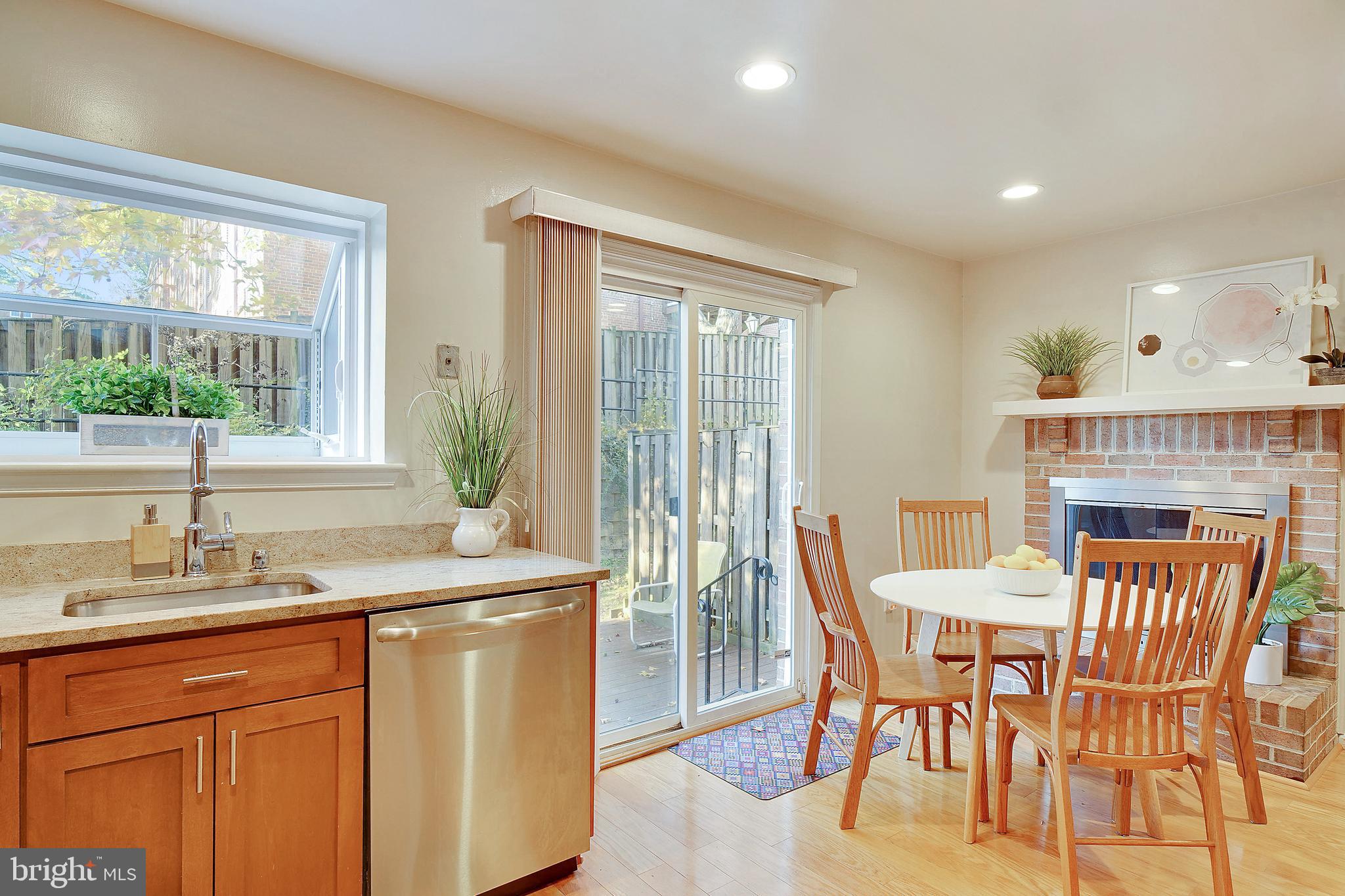 2125 Derby Ridge Lane, Unit 16 Silver Spring, MD 20910 - Photo 9 of 32 Sun drenched eat-in kitchen with fireplace