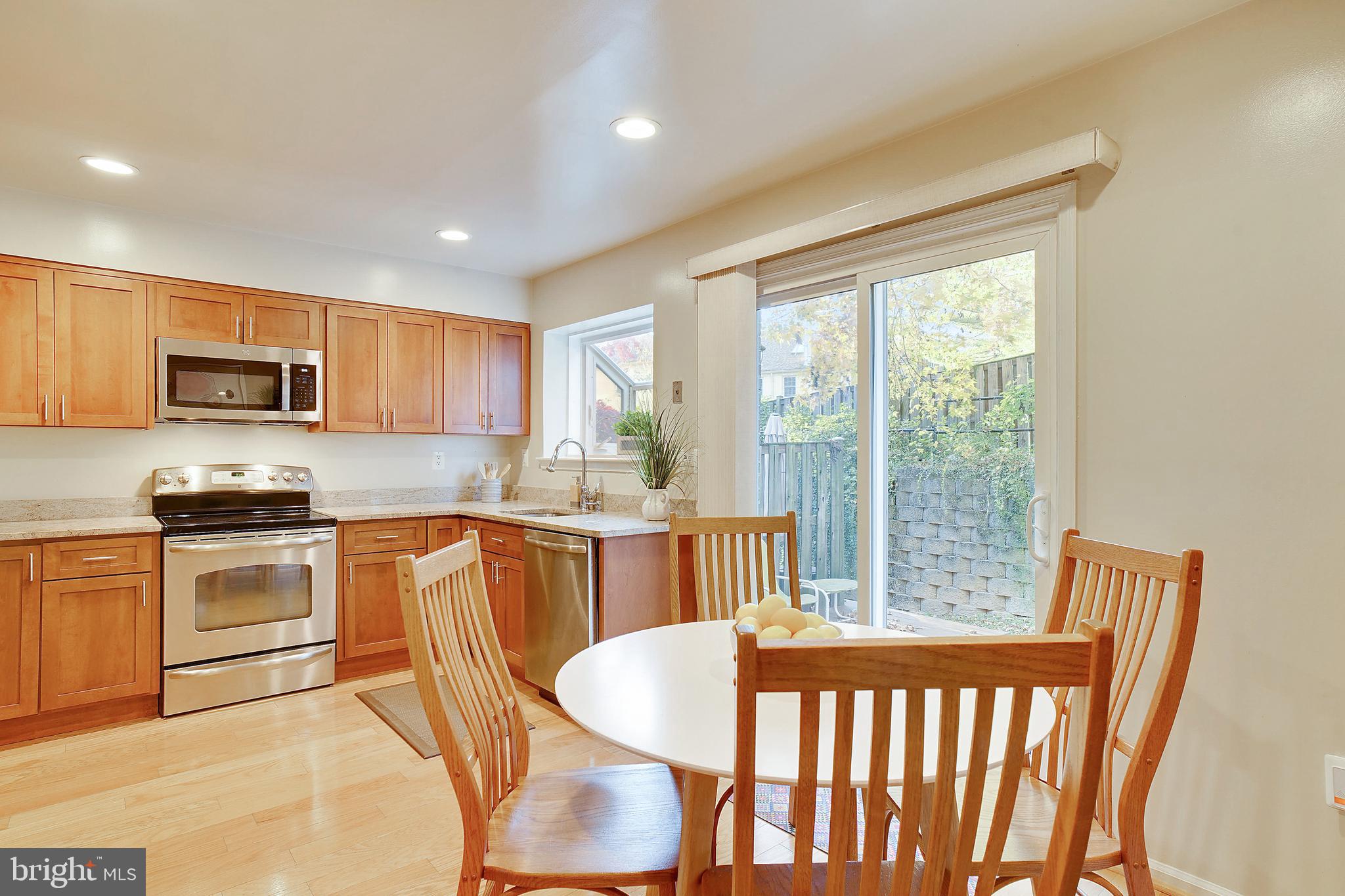 2125 Derby Ridge Lane, Unit 16 Silver Spring, MD 20910 - Photo 10 of 32 Kitchen opens to backyard patio