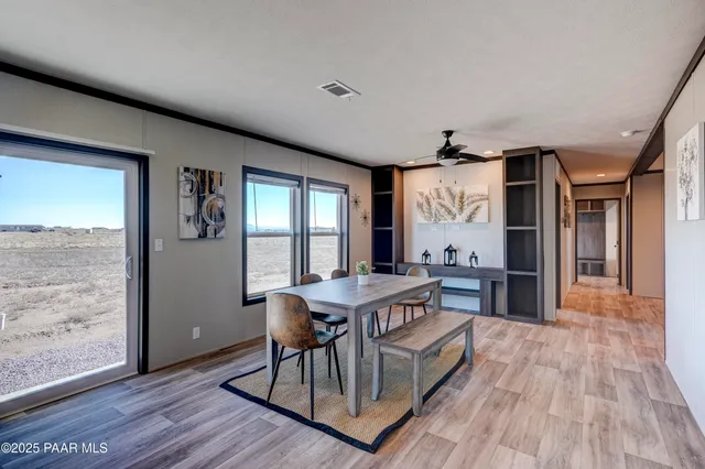 a bathroom with a sink and a window