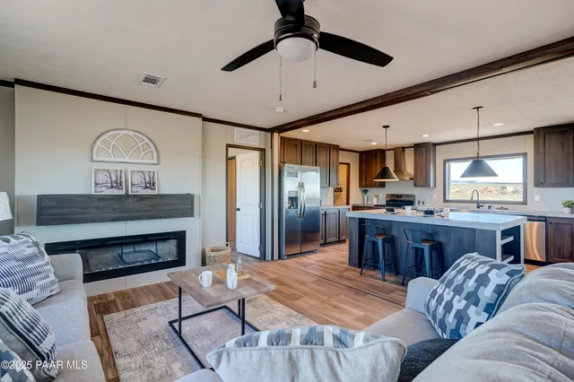 a view of a livingroom with wooden floor